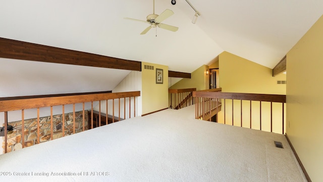 280 Winterberry Ln, Okemos, MI 48864 - additional living space featuring carpet flooring, vaulted ceiling, and a ceiling fan