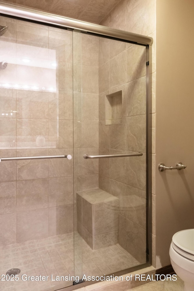 280 Winterberry Ln, Okemos, MI 48864 - full bathroom featuring toilet and a shower stall