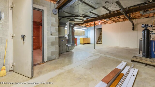 280 Winterberry Ln, Okemos, MI 48864 - basement with heating unit and stairs