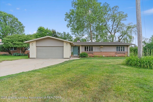 10138 Baron Blvd, Dimondale, MI 48821 - ranch-style house featuring a garage, driveway, a chimney, a front yard, and brick siding