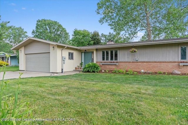 10138 Baron Blvd, Dimondale, MI 48821 - ranch-style house with an attached garage, a front lawn, a chimney, concrete driveway, and brick siding