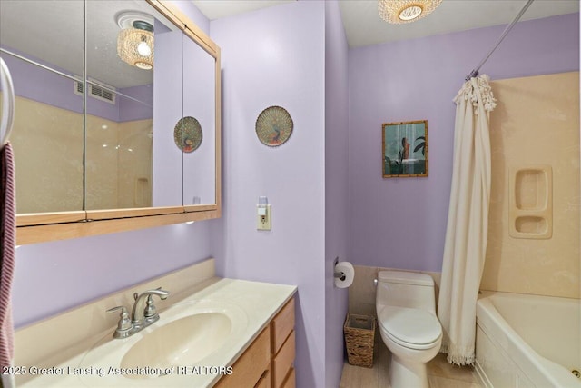10138 Baron Blvd, Dimondale, MI 48821 - full bathroom featuring vanity and shower / bath combo with shower curtain