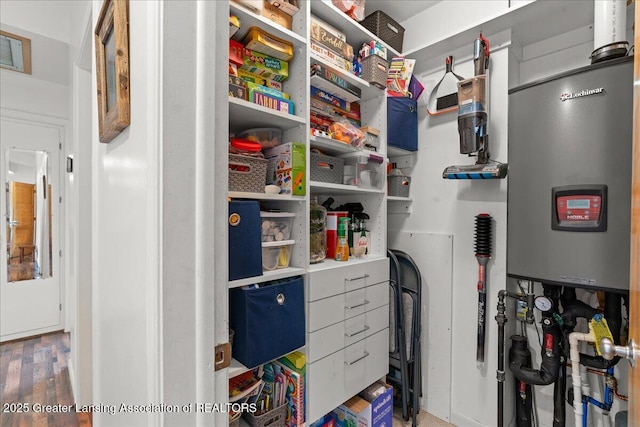 10138 Baron Blvd, Dimondale, MI 48821 - pantry featuring electric water heater