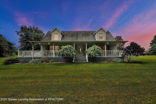14235 Saxton Rd, Springport, MI 49284 - view of front of property featuring covered porch and a yard
