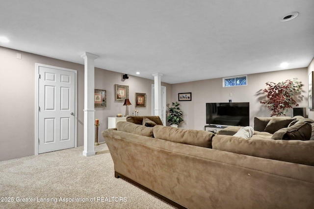 14235 Saxton Rd, Springport, MI 49284 - living area featuring decorative columns, light carpet, and recessed lighting