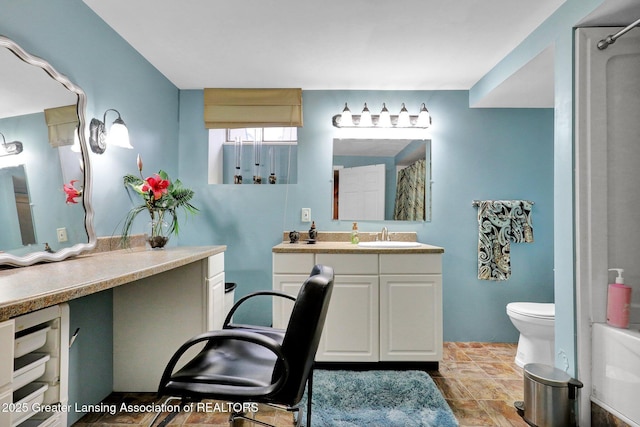14235 Saxton Rd, Springport, MI 49284 - bathroom featuring vanity, stone finish floors, and a shower with curtain
