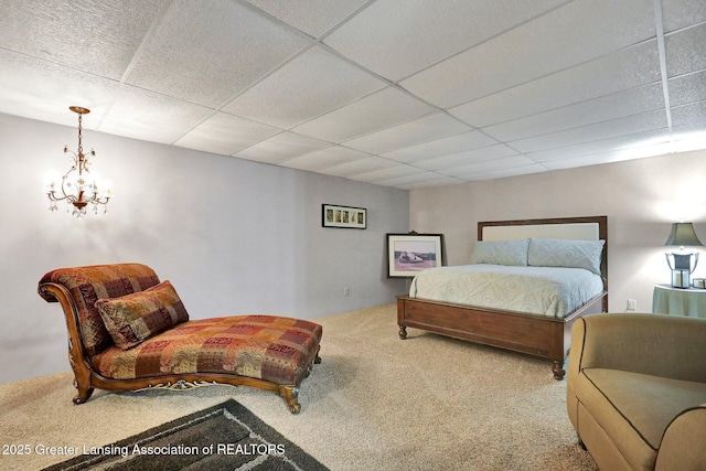 14235 Saxton Rd, Springport, MI 49284 - bedroom with carpet, a drop ceiling, and a chandelier