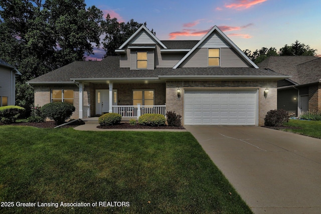 1823 Cricket Ln, East Lansing, MI 48823 - view of front of house with a porch, brick siding, and a front yard