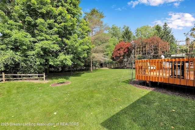 1823 Cricket Ln, East Lansing, MI 48823 - view of yard with a wooden deck