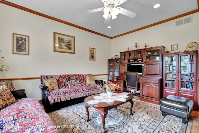 1823 Cricket Ln, East Lansing, MI 48823 - living area featuring ceiling fan, wood finished floors, recessed lighting, and crown molding