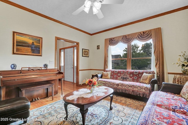 1823 Cricket Ln, East Lansing, MI 48823 - living area with a ceiling fan, light wood finished floors, and crown molding