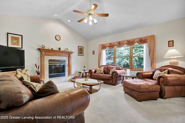 1823 Cricket Ln, East Lansing, MI 48823 - living area with a ceiling fan, carpet floors, a tile fireplace, high vaulted ceiling, and recessed lighting
