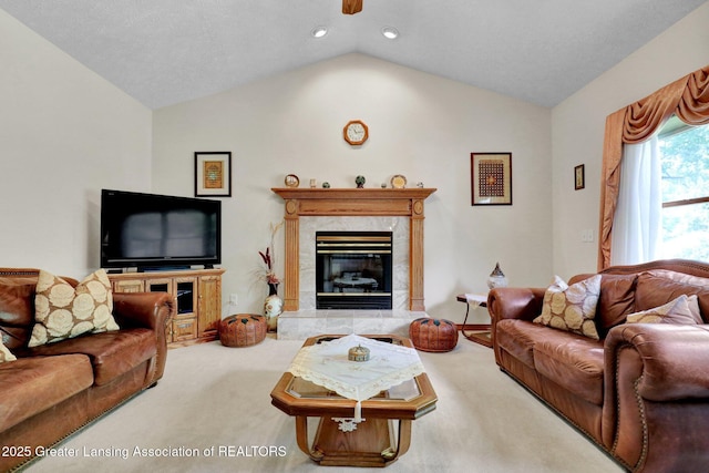 1823 Cricket Ln, East Lansing, MI 48823 - carpeted living area featuring lofted ceiling, recessed lighting, and a premium fireplace