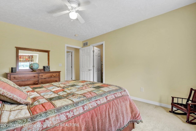 1823 Cricket Ln, East Lansing, MI 48823 - bedroom featuring light carpet, a textured ceiling, and ceiling fan