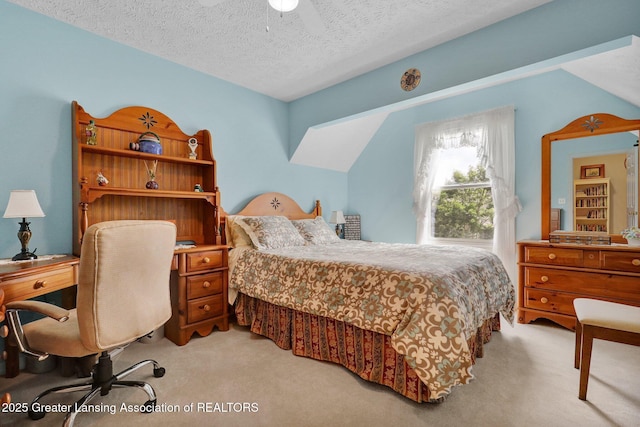1823 Cricket Ln, East Lansing, MI 48823 - bedroom featuring carpet, a textured ceiling, an office area, and a ceiling fan