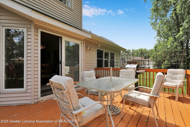1823 Cricket Ln, East Lansing, MI 48823 - wooden terrace featuring outdoor dining space and grilling area