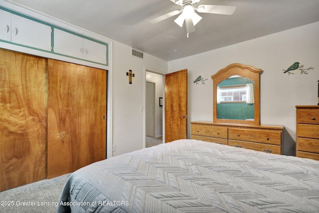 528 Thomas L Pkwy, Lansing, MI 48917 - bedroom featuring carpet flooring, a closet, and ceiling fan