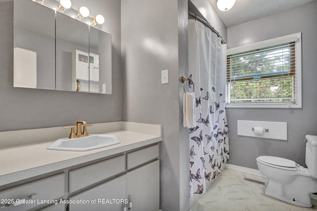 528 Thomas L Pkwy, Lansing, MI 48917 - bathroom with marble finish flooring, vanity, and a shower with shower curtain