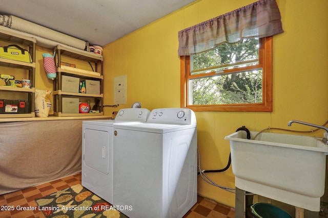 528 Thomas L Pkwy, Lansing, MI 48917 - washroom featuring tile patterned floors and washing machine and dryer