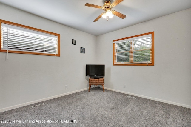 528 Thomas L Pkwy, Lansing, MI 48917 - carpeted spare room featuring healthy amount of natural light and ceiling fan