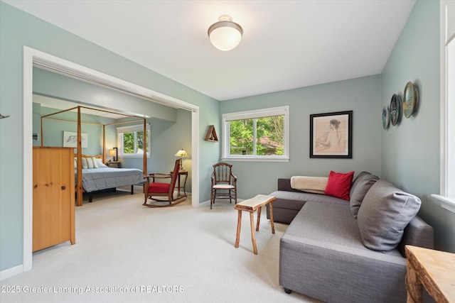2391 Shawnee Trl, Okemos, MI 48864 - carpeted living room with baseboards