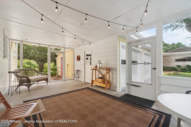 2391 Shawnee Trl, Okemos, MI 48864 - sunroom / solarium featuring plenty of natural light and rail lighting
