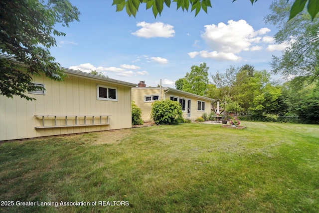 2391 Shawnee Trl, Okemos, MI 48864 - view of green lawn with a patio