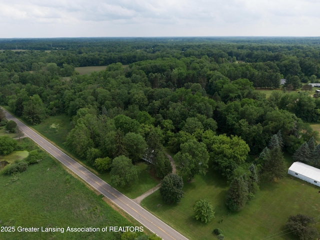 6631 Springport Rd, Jackson, MI 49201 - drone / aerial view of a heavily wooded area