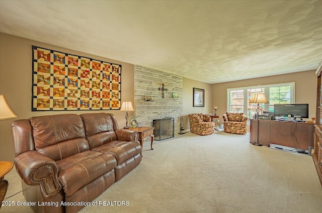 2300 Hampshire Rd, Lansing, MI 48911 - living room featuring carpet flooring and a stone fireplace