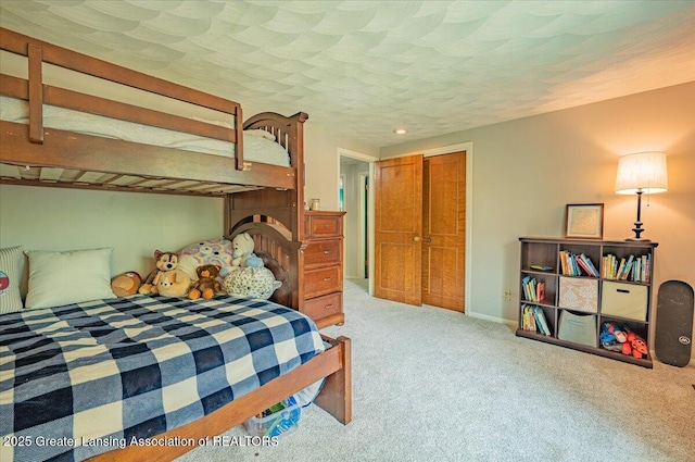 2300 Hampshire Rd, Lansing, MI 48911 - carpeted bedroom with a closet and recessed lighting