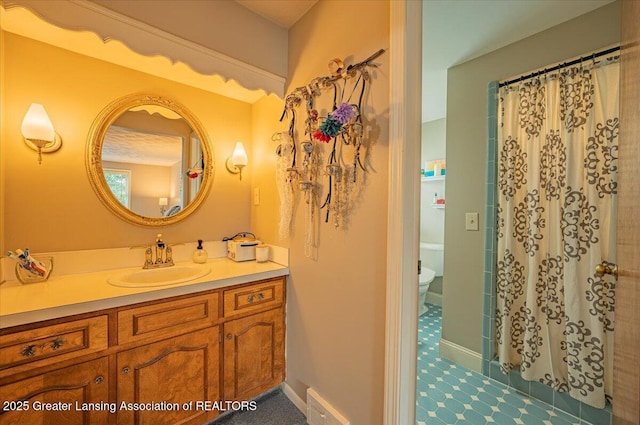 2300 Hampshire Rd, Lansing, MI 48911 - bathroom featuring vanity and curtained shower