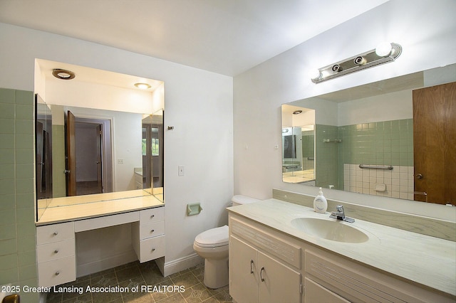 3739 Ridgefield Rd, Lansing, MI 48906 - bathroom with vanity and tile patterned flooring