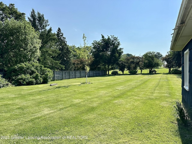 943 Lantern Hill Dr, East Lansing, MI 48823 - view of yard featuring view of scattered trees