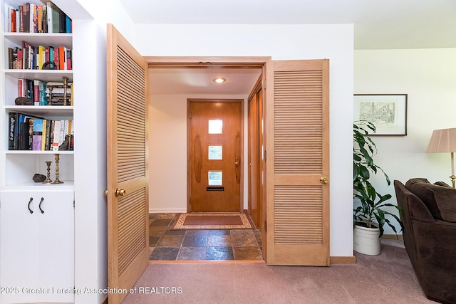943 Lantern Hill Dr, East Lansing, MI 48823 - carpeted foyer featuring recessed lighting and stone finish flooring