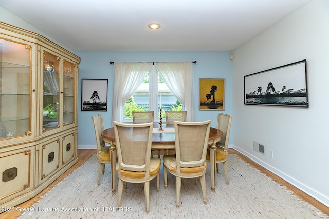 943 Lantern Hill Dr, East Lansing, MI 48823 - dining room with light wood-style floors and recessed lighting