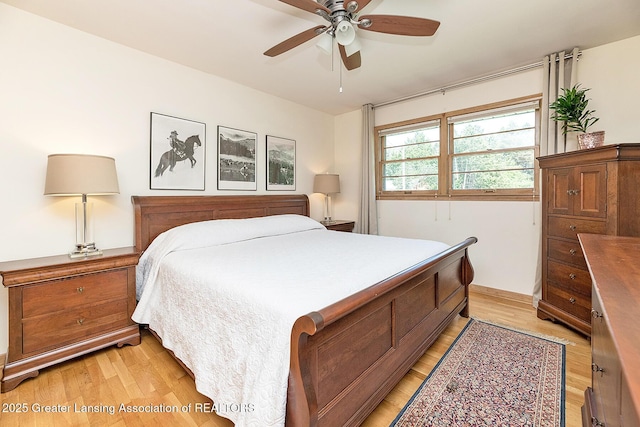 943 Lantern Hill Dr, East Lansing, MI 48823 - bedroom featuring light wood-style flooring and a ceiling fan