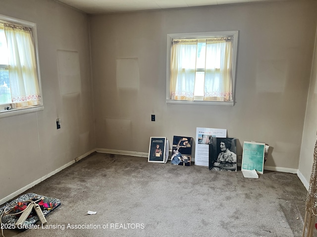 500 N Catherine St, Lansing, MI 48917 - spare room with carpet floors
