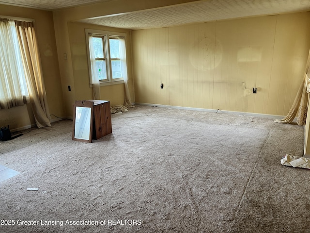 500 N Catherine St, Lansing, MI 48917 - unfurnished room with carpet flooring and baseboards