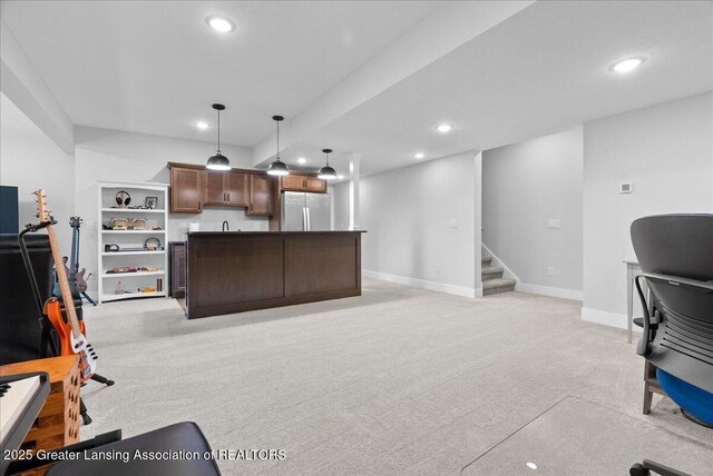 6102 Sleepy Hollow Ln, East Lansing, MI 48823 - living area with bar with sink, light carpet, stairway, and recessed lighting