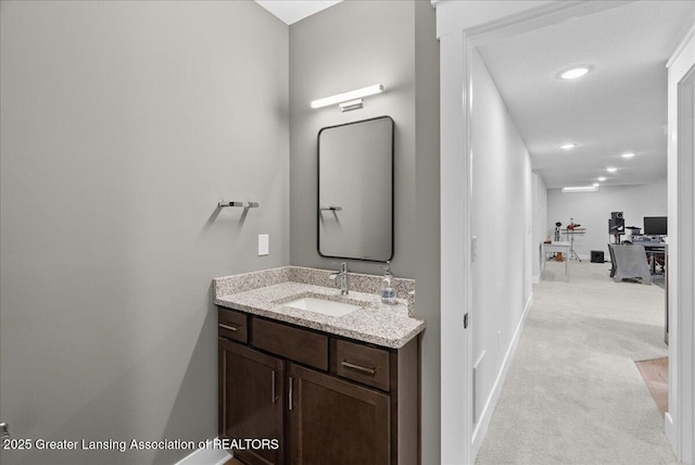 6102 Sleepy Hollow Ln, East Lansing, MI 48823 - bathroom with vanity and recessed lighting