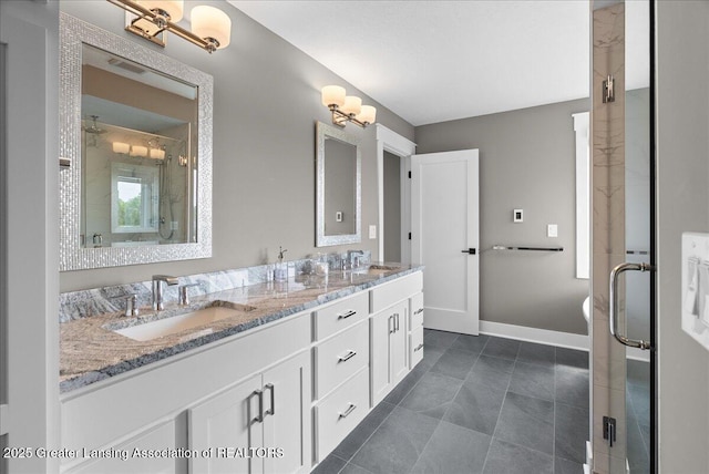 6102 Sleepy Hollow Ln, East Lansing, MI 48823 - full bathroom with a shower stall, double vanity, and tile patterned floors