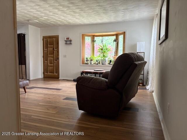 6321 Marywood Ave, Lansing, MI 48911 - living room featuring wood finished floors