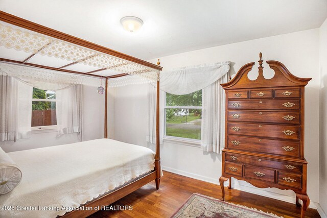2782 Roseland Ave, East Lansing, MI 48823 - bedroom with wood finished floors and baseboards