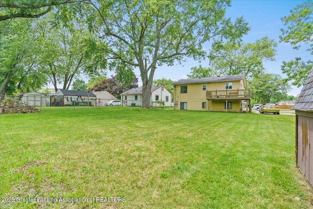 4733 S Pennsylvania Ave, Lansing, MI 48910 - view of yard featuring a wooden deck