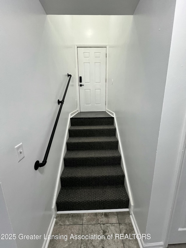4733 S Pennsylvania Ave, Lansing, MI 48910 - stairs with carpet floors and baseboards