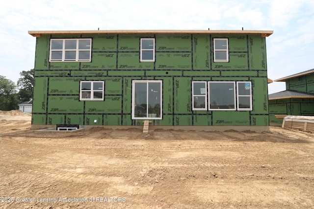 612 Titanium Trl, Haslett, MI 48840 - rear view of house