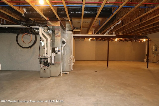 612 Titanium Trl, Haslett, MI 48840 - unfinished below grade area with heating unit