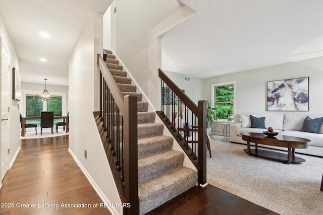 3901 W Howe Rd, Dewitt, MI 48820 - stairway with hardwood / wood-style flooring and recessed lighting