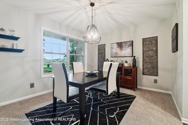3901 W Howe Rd, Dewitt, MI 48820 - carpeted dining room featuring a chandelier and baseboards
