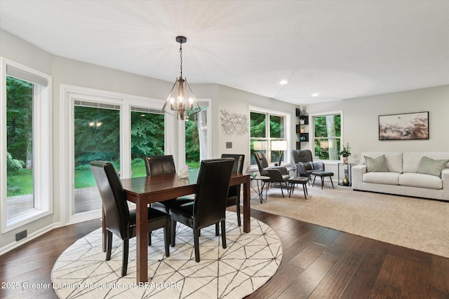 3901 W Howe Rd, Dewitt, MI 48820 - dining space with healthy amount of natural light, a chandelier, wood finished floors, and recessed lighting